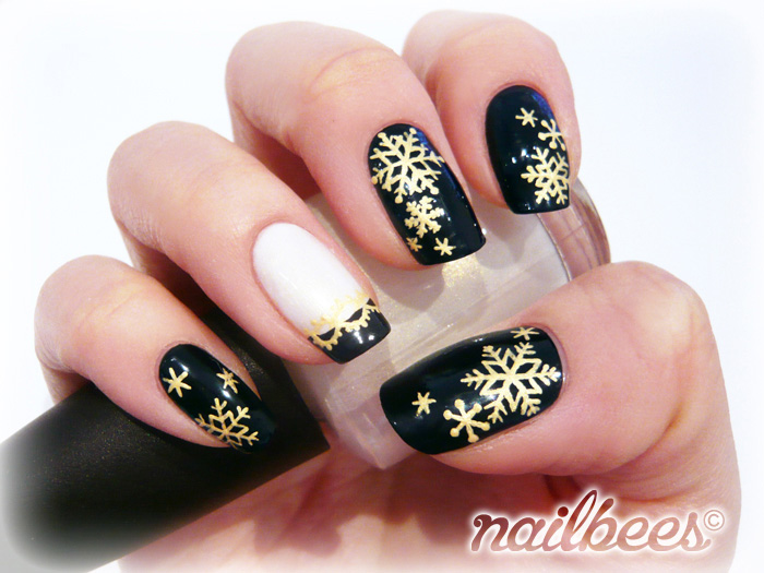 Black Nails With Gold Snowflakes Design Christmas Nail Art