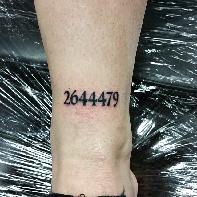 Black Numbers Tattoo On Ankle