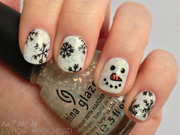 Black Snowflakes And Snowman Christmas Nail Art