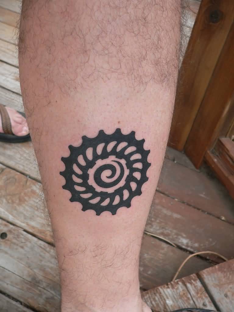 Black Spiral Tattoo On Leg
