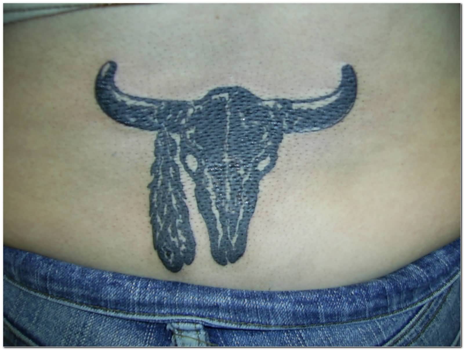 Black Western Cow Skull Symbol Tattoo On Lower Back