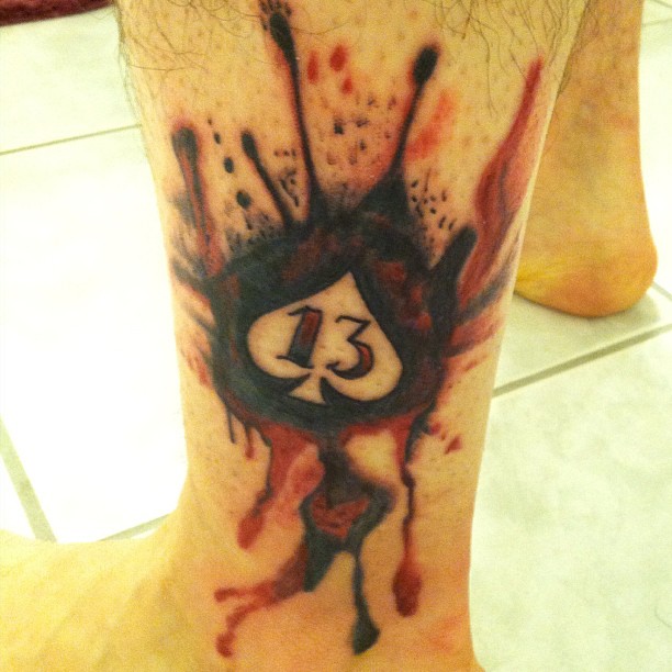 Bleeding Ace Card Symbol And 13 Number Tattoo On Ankle
