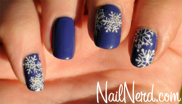 Blue Nails With Snowflakes Design Christmas Nail Art