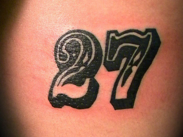 Bold 27 Done In Black And White Tattoo