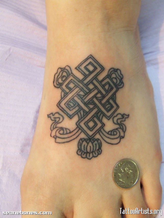 Buddhist Endless Knot With Lotus Flower Tattoo On Foot