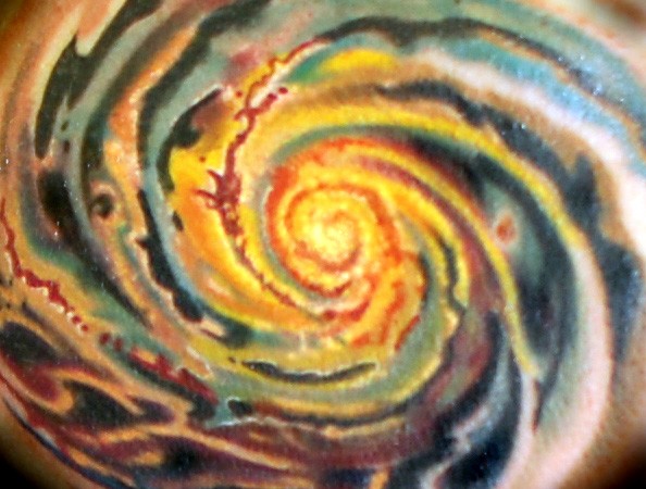 Colorful Spiral Galaxy Tattoo On Chest