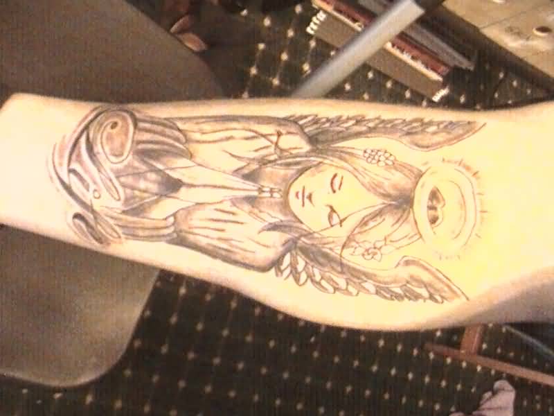 Cool Angel Praying Tattoo On Forearm By Soldiersinktattoos