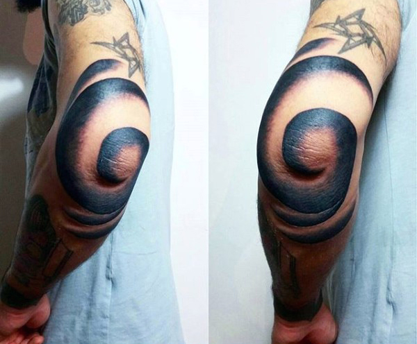 Cool Spiral Tattoo On Elbow
