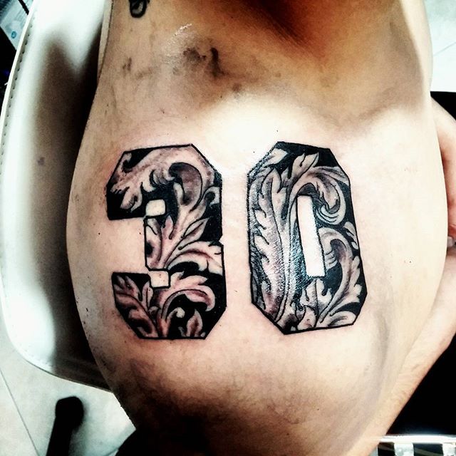 Creative Leaves In Thirty Numbers Tattoo On Upper Shoulder For Men