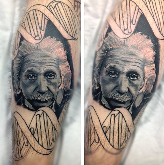 Einstine Portrait With DNA Science Tattoo On Arm