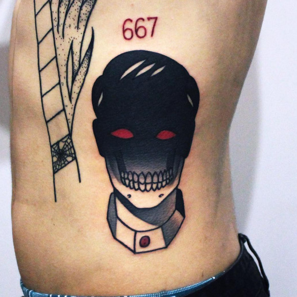 Evil Face With Number Tattoo On Side Rib For Men
