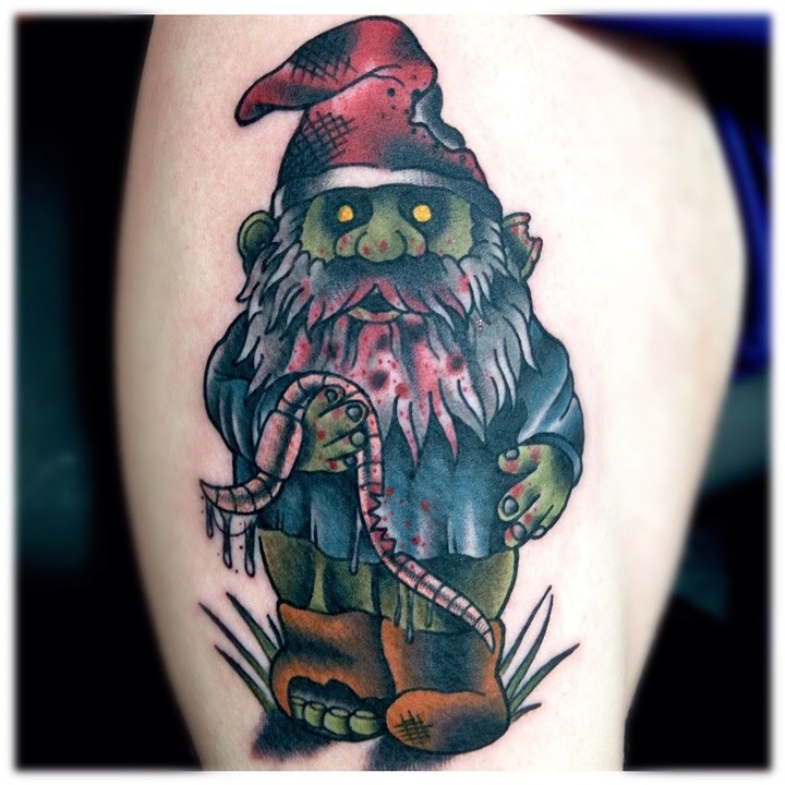 Evil Spectacular Gnome Eating Earth Worm Tattoo