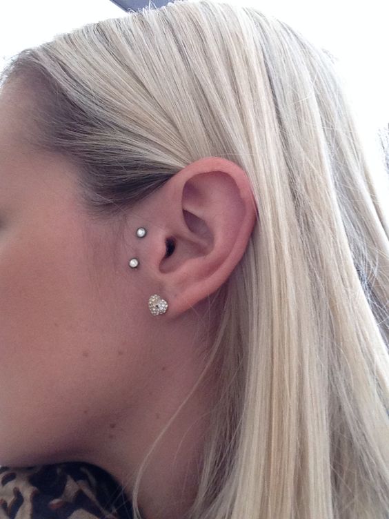 Girl With Lobe And Surface Ear Piercing