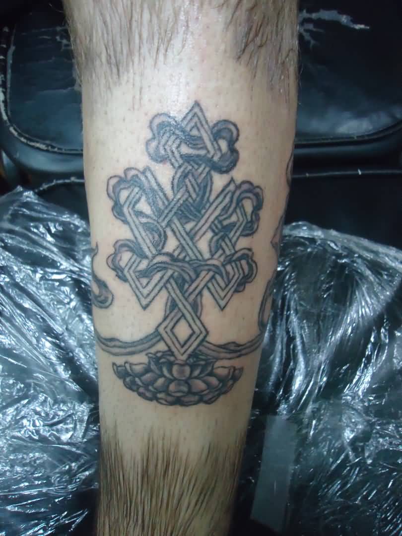 Grey Buddhist Endless Knot Tattoo On Leg