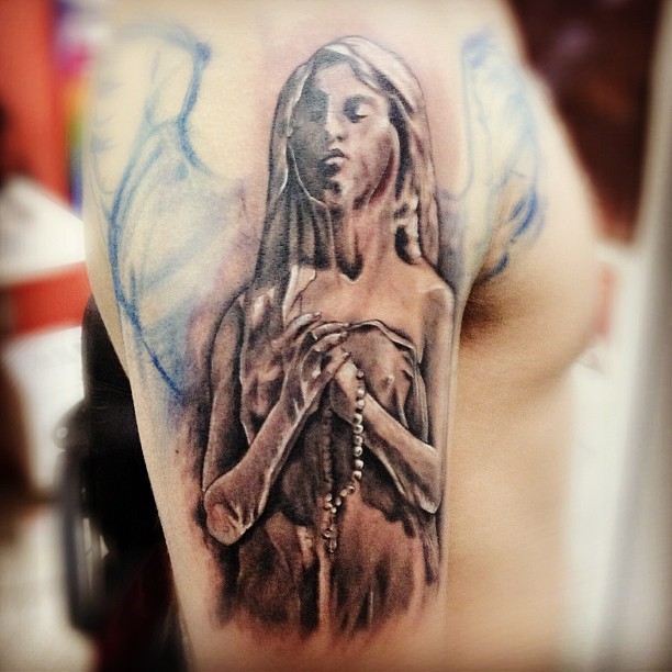 Grey Ink Praying Angel Tattoo On Right Half Sleeve