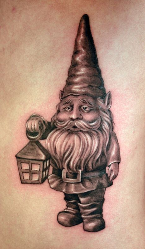 Grey Ink Spectacular Gnome With Lantern Tattoo