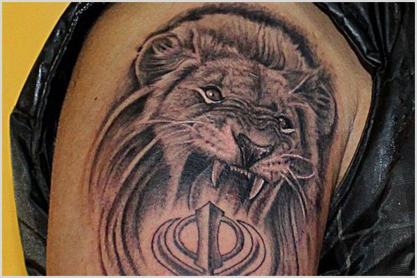 Grey Punjabi Lion Tattoo On Right Shoulder