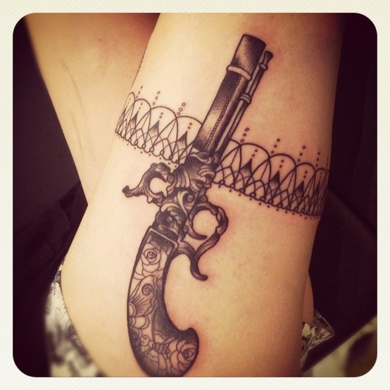 Grey Western Gun Tattoo On Sleeve