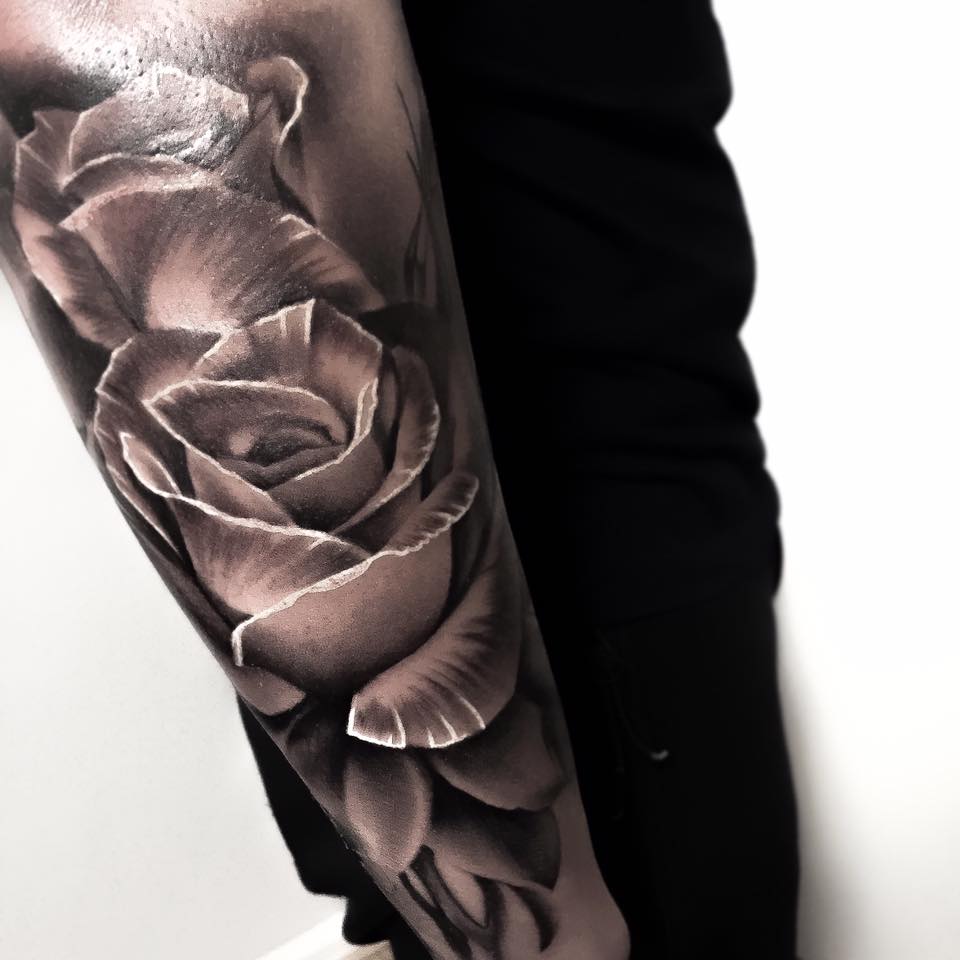 Grey ink 3D rose tattoo on arm