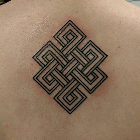 Impressive Endless Knot Tattoo On Upper Back
