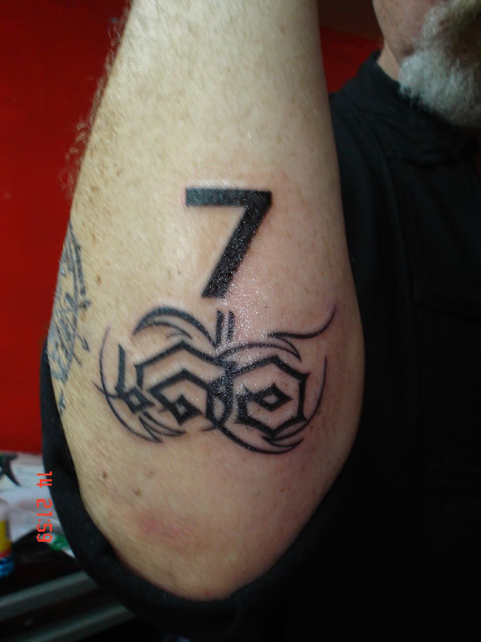 Impressive Seven Number Tattoo On Arm Sleeve For Men