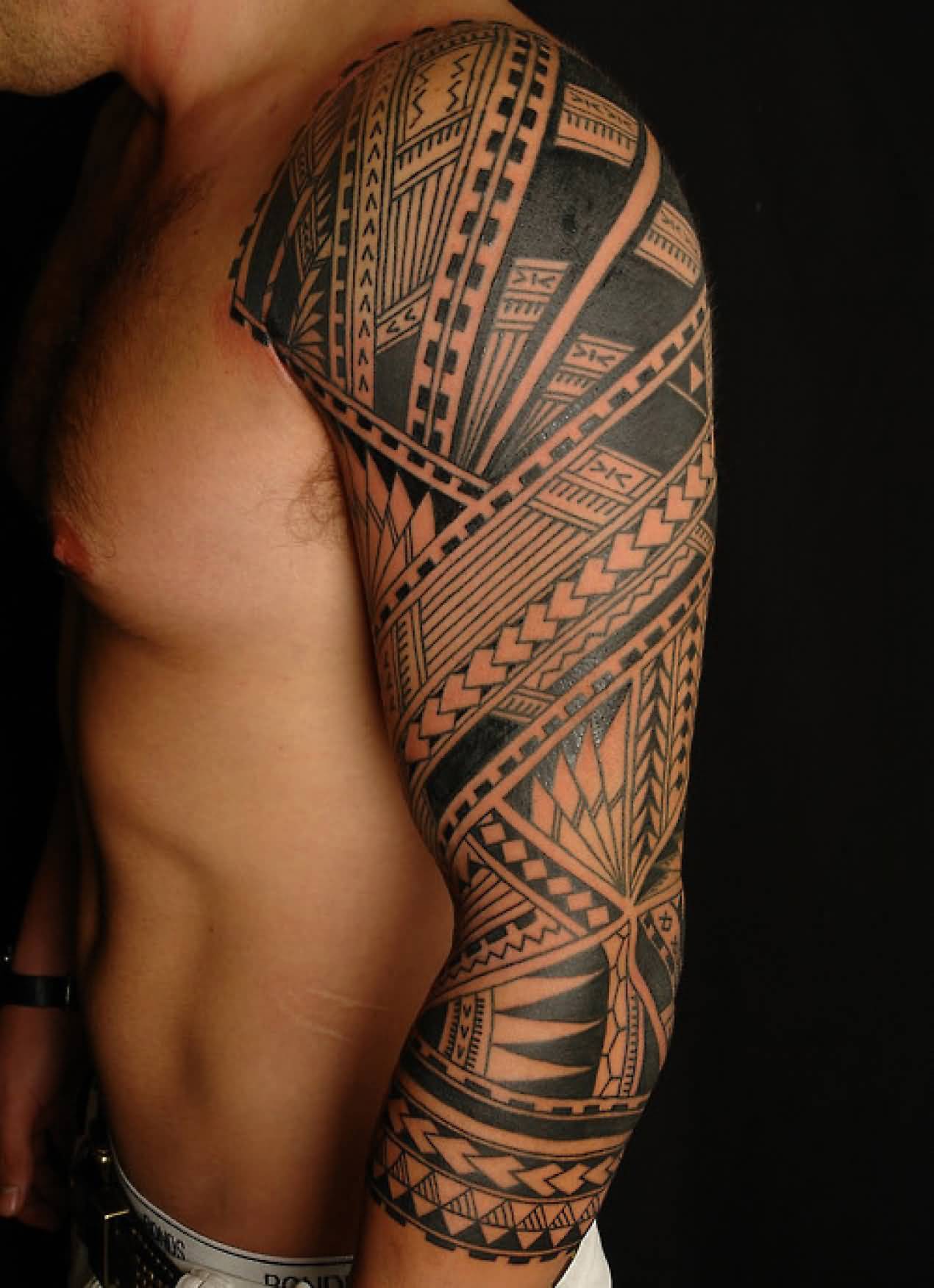 Impressive Tribal Maori Western Tattoo On Left Full Sleeve