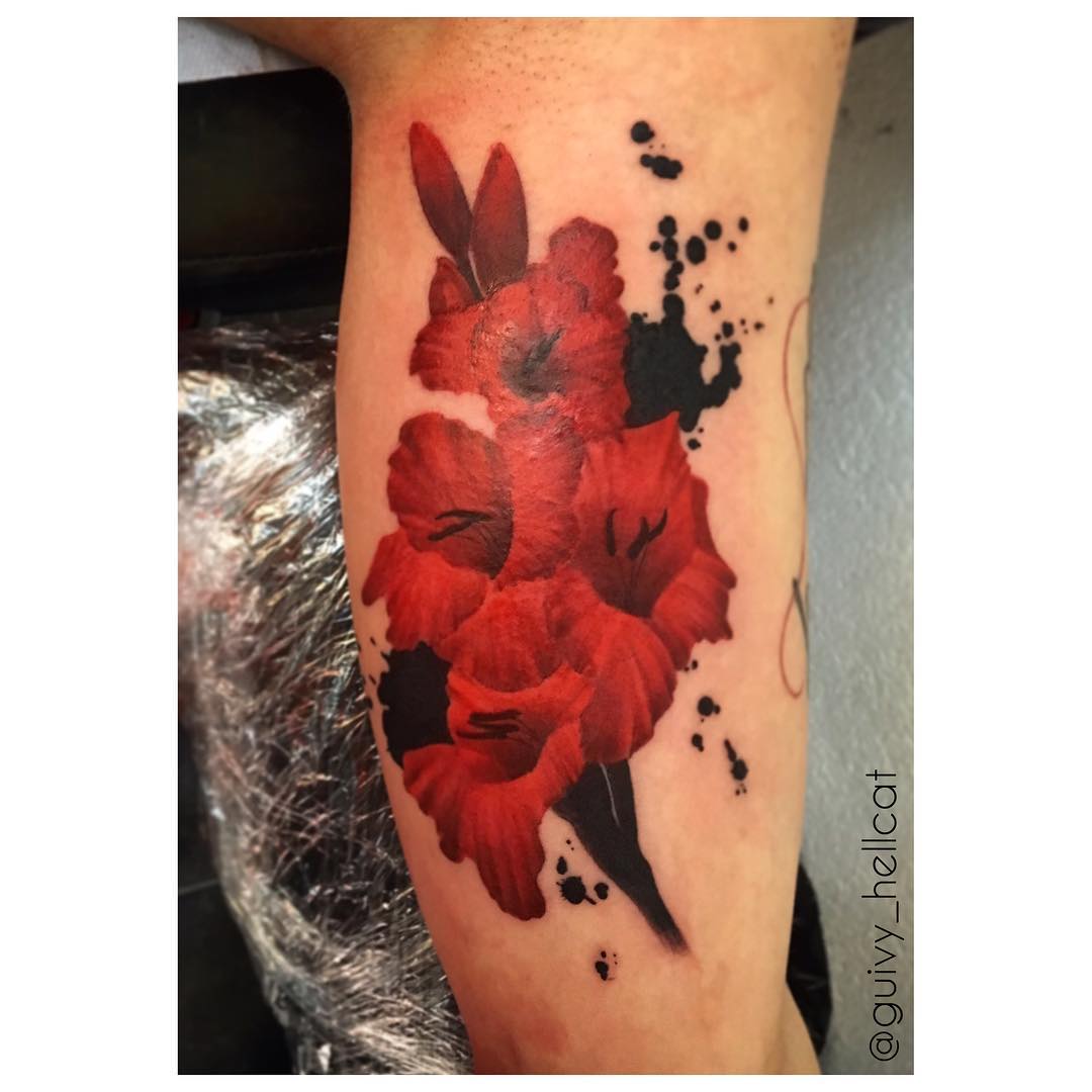 Inspiring Red Gladiolus Flowers Tattoo On Leg