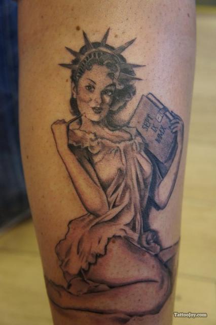 Liberty Pin Up Girl Tattoo On Forearm.