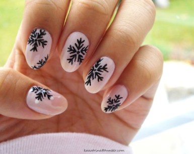 Light Pink Nails With Black Snowflakes Design Nail Art