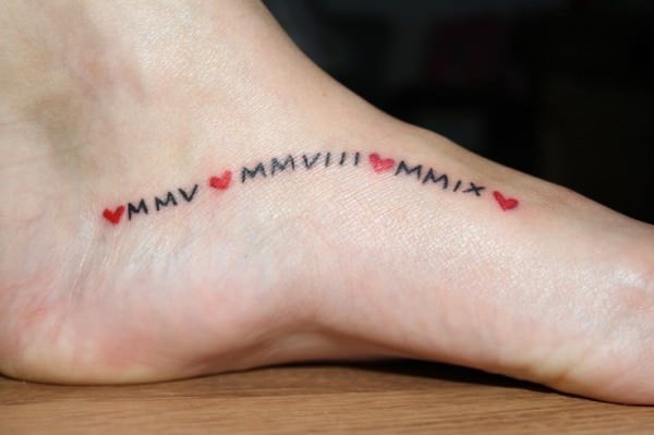 Love Roman Numbers Tattoo On Foot