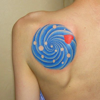Lovely Blue Spiral Tattoo On Left Back Shoulder