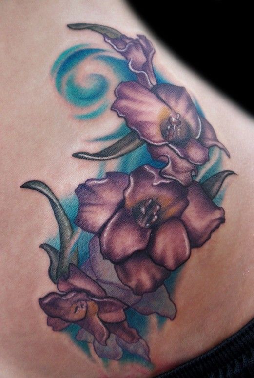 Lovely Gladiolus Flowers Tattoo On Right Back Shoulder