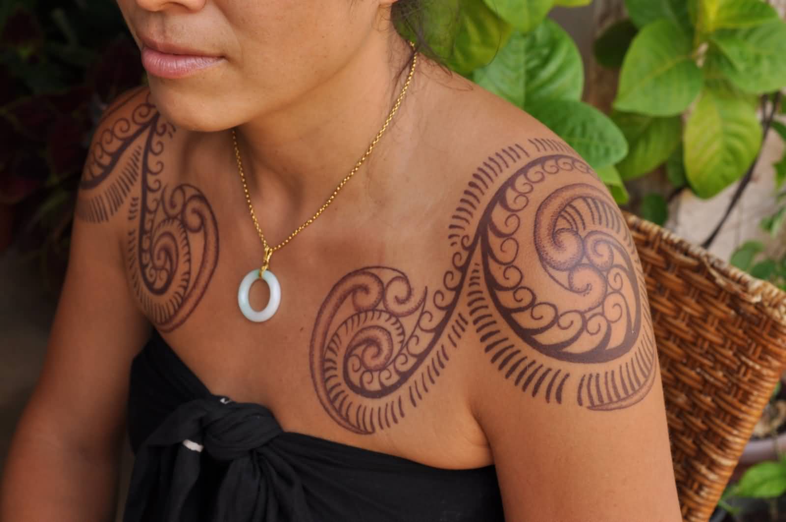Lovely Maori Spiral Tattoo On Upper Shoulders For Girls