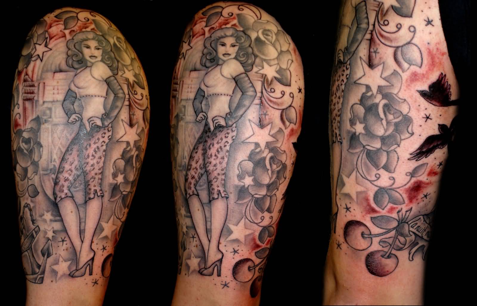 Lovely Pin Up Girl With Stars And Flowers Tattoo