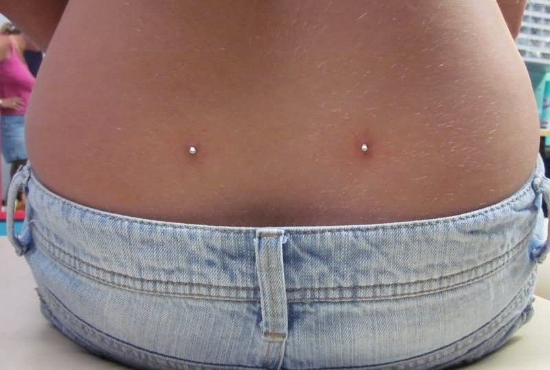 Lower Back Piercing With Silver Anchors For Girls