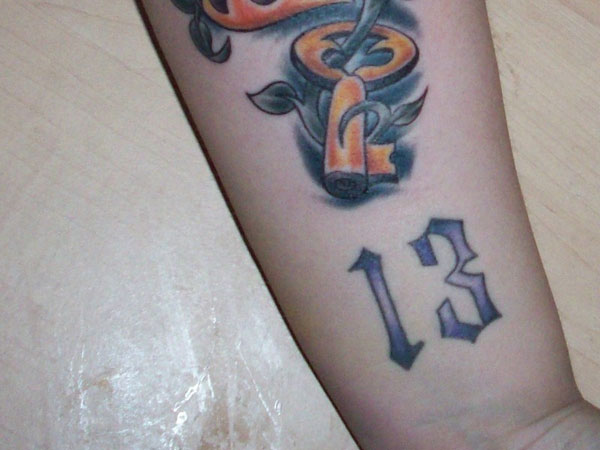 Magical Key With 13 Number Tattoo On Forearm