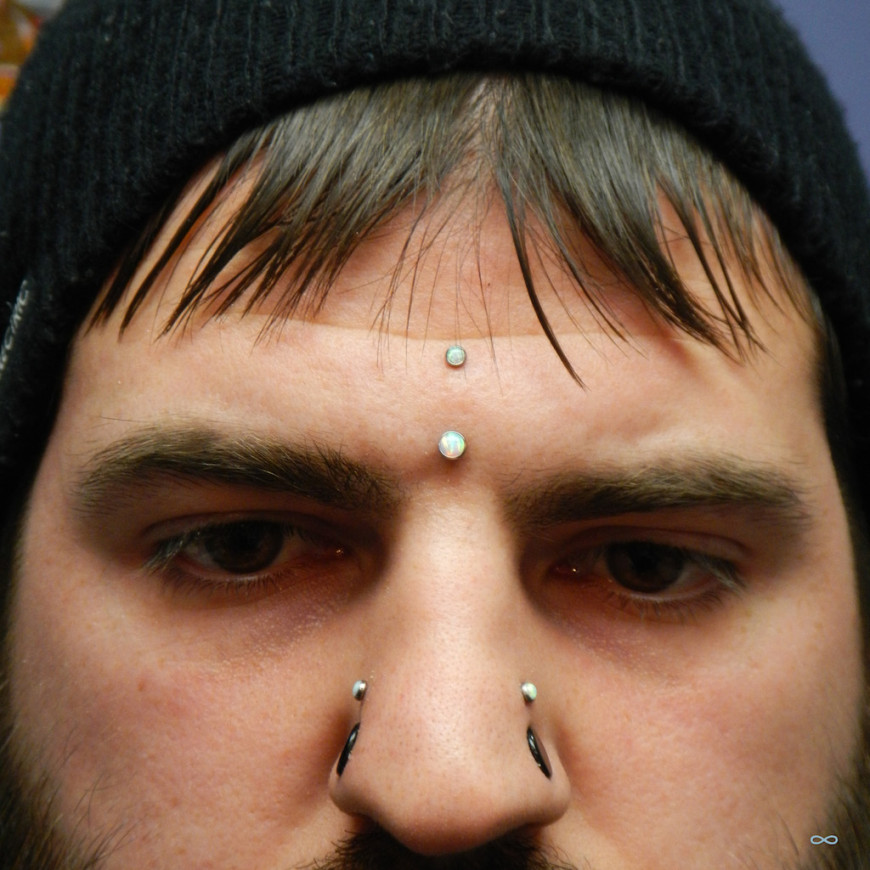 Man With Nose And Surface Bridge Piercing