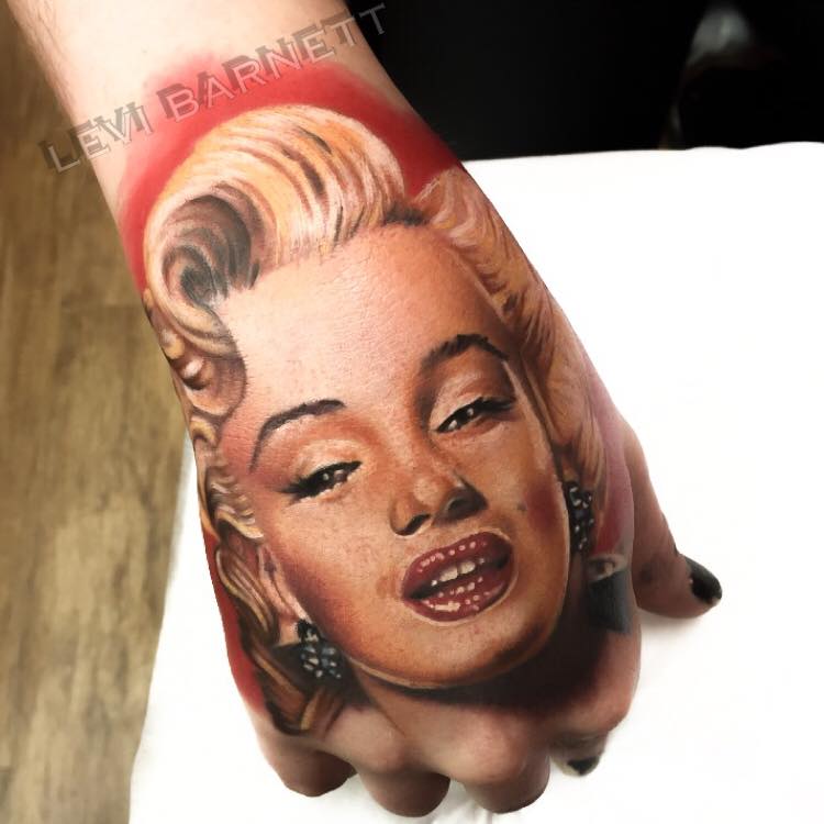 Marilyn Monroe tattoo on hand by Levi Barnett