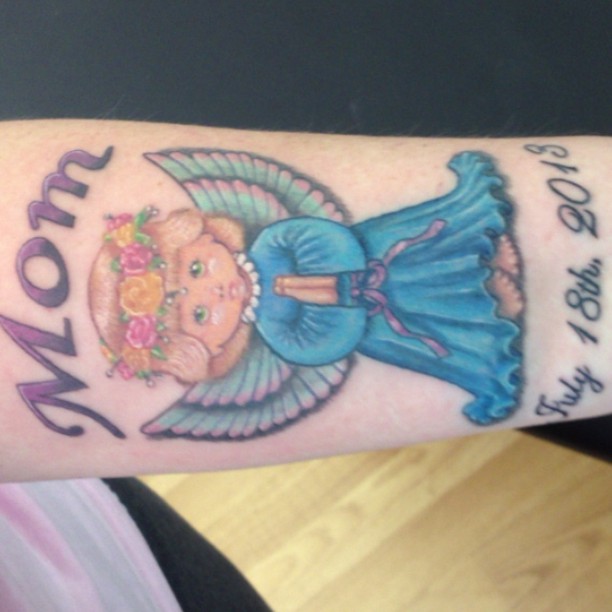 Mom Color Ink Angel Remembrance Tattoo On Forearm