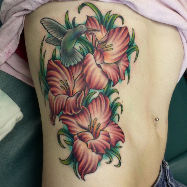 Nature Gladiolus Flowers Tattoo On Side Rib For Girls