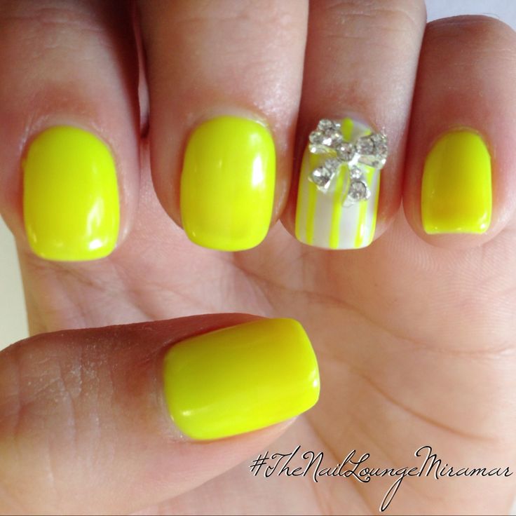 Neon Yellow Nails With 3D Bow Stud Design Nail Art