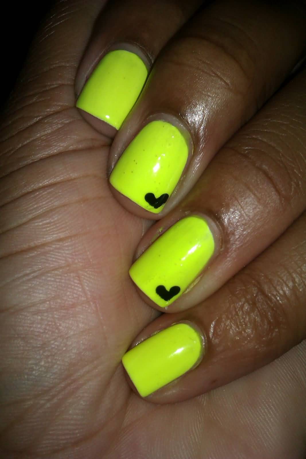 Neon Yellow Nails With Black Heart Design Nail Art