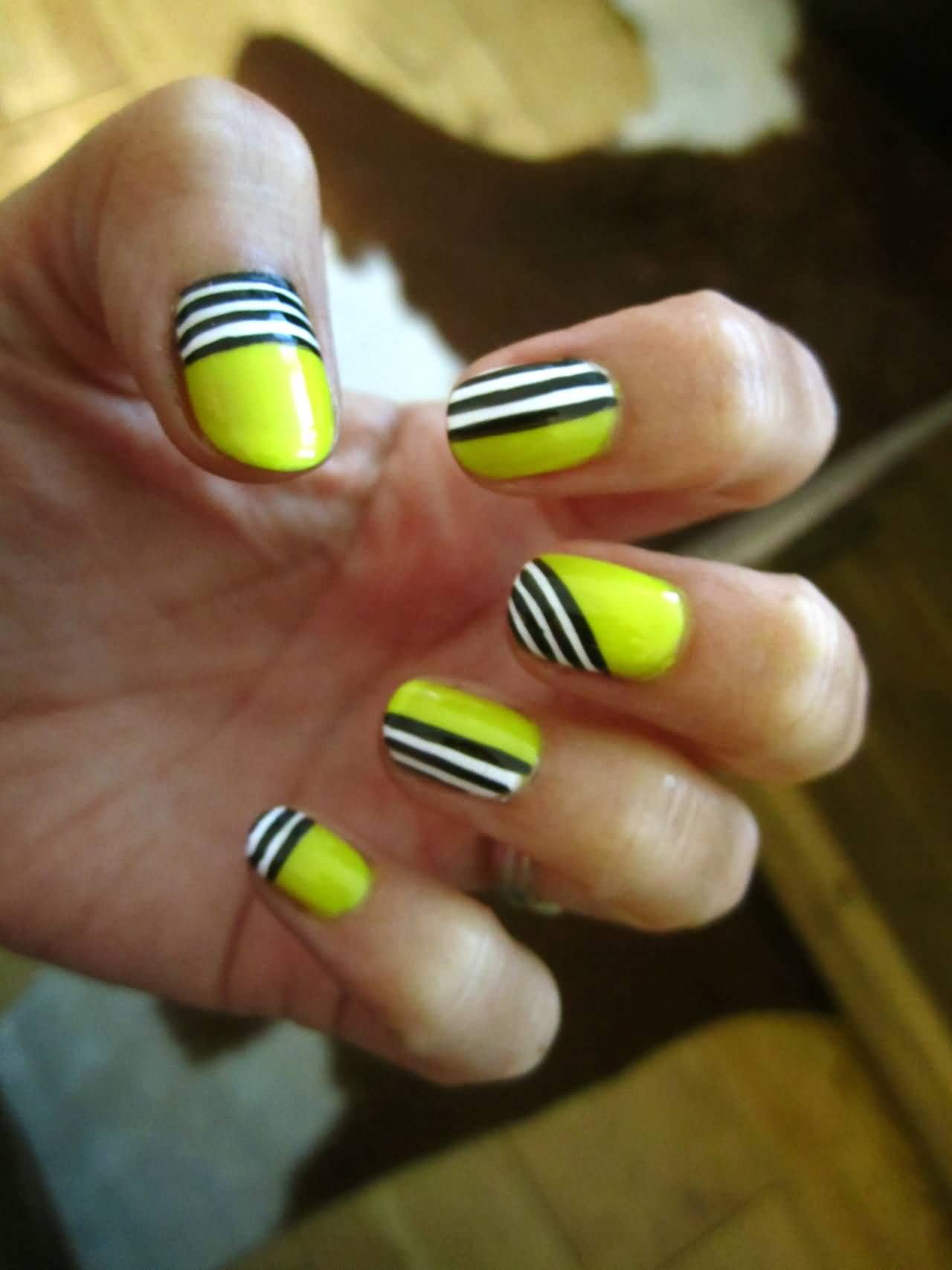 Neon Yellow With Black And White Stripes Design Nail Art