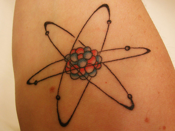 Nice Atom Science Tattoo On arm