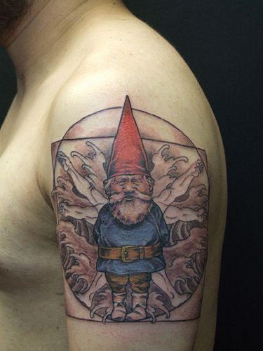Nice Gnome With Water Waves Tattoo On Left Shoulder