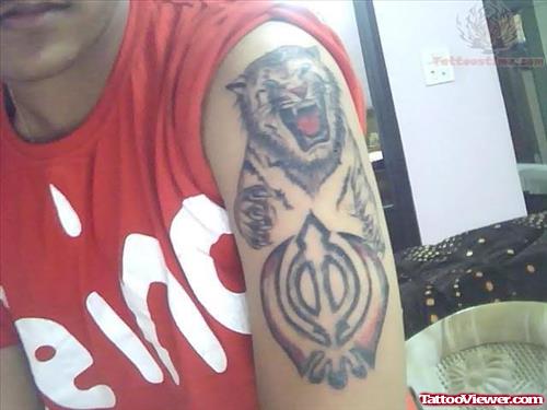 Nice Lion And Khanda Punjabi Tattoo On Left Shoulder