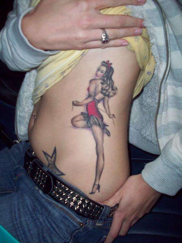 Nice Pin Up Girl Tattoo On Side Rib For Girls