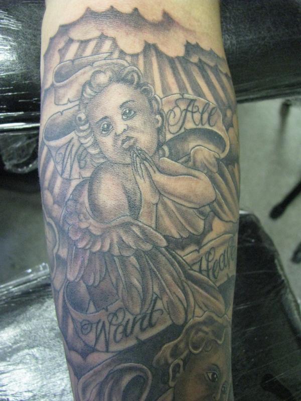 Nice Praying Baby Angel Tattoo On Sleeve