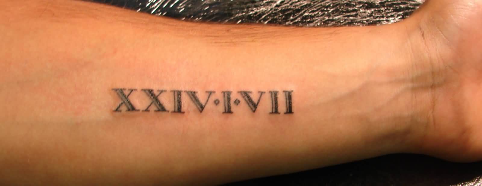 Nice Roman Numbers Tattoo On Forearm