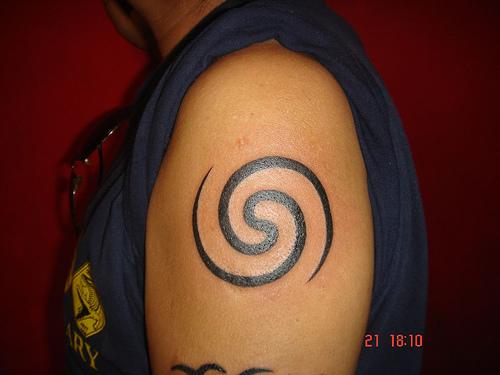 Nice Spiral Tattoo On Left Shoulder
